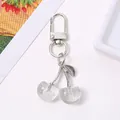 Cute glittery transparent cherry keychain with silver metal finish for bags - White