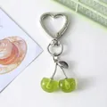 Adorable green glitter resin cherry keychain with silver heart-shaped clasp for bags - Heart Green