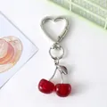 Cute and sparkly red cherry fruit keychain charm with heart-shaped metal clasp for bags - Heart Clasp Dark Red