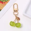 Cute green glitter translucent cherry keychain with gold metal clasp for bags and keys - KC Gold Green