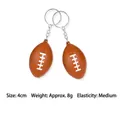 Miniature brown foam American football keychain for stress relief 4cm squeeze toy ball - Rugby Style / 4cm