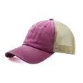Side detail view of a vintage distressed pink washed cotton mesh trucker baseball cap - Adjustable / Rose Red