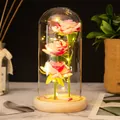 Three artificial roses in a glass dome with warm LED lights and a wooden base - Wood Base Pink Flower + Petals