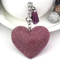 Sparkling heart-shaped pink rhinestone keychain with purple tassel and silver hardware - White K + Purple