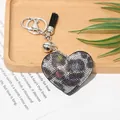 Charming heart-shaped leather keychain with colorful rhinestones and black tassel - Silver + Black and White Leopard