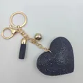 Elegant black heart-shaped rhinestone leather keychain with tassel and gold-tone hardware - Gold Tone + Black Base With Black Rhinestones