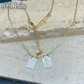 Dettaglio dei pendenti religiosi in madreperla della Vergine Maria su catena in acciaio oro - 8*11mm