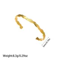 Detailed view of gold plated twisted titanium steel cuff bangle with 5mm width and weight info - Spiral Wave Design (YY122)