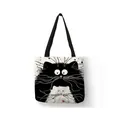 Close-up detail of cartoon cat print on high-quality linen shopping tote bag with heart - 34*38 / Black and White Cat Party Illustration (11)