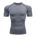 T-shirt de sport à manches courtes de compression gris pour homme avec coutures raglan - S / Gris