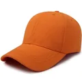 Classic vibrant orange solid color baseball cap for outdoor sports and sun protection - Adjustable / Orange