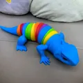 Detailed macro view of a colorful rainbow jointed fidget lizard toy with scaly texture - Sapphire Blue