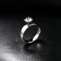 Elegant 316L stainless steel ring with a 6mm solitaire zircon set on black leather. - US 5 / 6mm with Zirconia / Steel