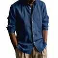 Detail view of a navy blue men's linen shirt with white buttons and natural texture - Navy Blue