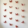 Elegant 3D reddish-orange butterfly paper garlands for festive wall decoration. - Rose Gold Small
