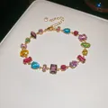 Elegant gold-tone bracelet featuring vibrant multi-colored geometric zircon stones. - 27# Bracelet