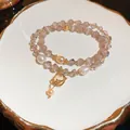 Elegant 18k gold plated double-layer bracelet with pearls, crystals and cat's eye beads - Bracelet / Pink