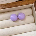 Elegant round purple glossy stud earrings displayed in a luxury wooden jewelry box - 39# Silver Post - Round Studs / Purple