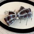 Elegant vintage plaid fabric bow hair clip featuring a delicate pearl dangle charm - Blue