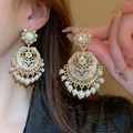 Ornate gold chandelier earrings with floral filigree, rhinestones, and white pearls. - 39# Silver Needle - Regular - Gold