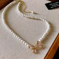 Elegant French style pearl necklace featuring a detailed bow pendant with gold hardware - Gold-White Small Pearl Style / 5mm