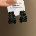 Vintage style black earrings featuring green and red zircon pavé on a white display card - Gunmetal Black Green (57#)