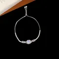 Elegante bracciale in argento con pietre di zircone quadrate e catena a scorrimento regolabile - Braccialetto scorrevole con tre zirconi rettangolari (73#) / Argento