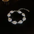 Sparkling silver-tone bracelet with teardrop-shaped zircons and star-effect shine - Teardrop Stone Style (51#)