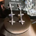 Boucles d'oreilles pendantes en argent avec des fleurs en diamant au design de luxe. - Style Long Triple Fleur (1#)