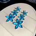 Prachtige blauwe marquise kristallen bloemoorbellen met een 925 zilveren oorsteker. - Stijl 26 (HE32568)