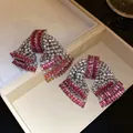 Élégantes boucles d'oreilles en forme de nœud avec strass roses et clairs. - Style Pavé de Noeud Rose (44#)