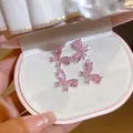 Elegante roze vlinder oorknopjes met peervormige zirkonia - Stijl 34 (HE32568)