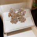 Elegante fonkelende goudkleurige vlinder oorknopjes met strass en zilveren naald - Stijl 59 (HE32568)
