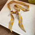 Retro yellow wave pattern fabric scarf necklace with multi-colored bead ornaments. - Yellow Style (Beaded)