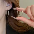 Minimalist silver oval hoop earrings featuring an elegant and trendy design for women - Minimalist Large Oval Hoop (66#) / 25mm / Silver