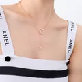 Elegante roségoldene Stern und Mond Y-Halskette aus hochwertigem Edelstahl für Damen - 40+5cm / Roségold