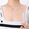 Elegante Halskette mit Stern und Mond aus Edelstahl für Damen mit 18k Silber-Finish Überzug - 48cm / Stahlfarbe