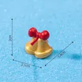 Miniature resin Christmas gold bells ornament with red bow, measures 2.1x1.4x2cm - Christmas Bell