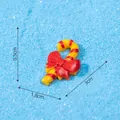 Small Christmas resin candy cane ornament with red bow decoration, 3cm x 1.8cm - Yellow Red Candy Cane