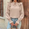 Elegante blusa de manga larga color albaricoque con volantes y cuello con lazo de moda - S / Albaricoque