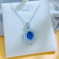 Close-up detail of royal blue sapphire pendant necklace with double halo diamond surround - Light Blue Pendant (With Chain)