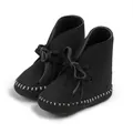 Bottes de bébé noires souples avec coutures blanches et nœud pour l'hiver - 11cm (0-6 Mois) / Noir