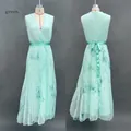 Front and back view of a stylish mint green tie-dye pleated sleeveless maxi dress - S / Green