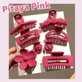 Macro view of hot pink hair claw clips set in various shapes with premium matte finish - 8-Piece Set / Dragon Fruit