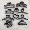 Various styles of grey leopard print hair claw clips for women on soft white background - 10-Piece Set / Grey Purple Leopard