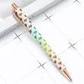 Mint green glitter ballpoint pen with colorful heart pattern and rose gold accents - Yellow Heart (Rose Gold Hardware) / 1.0mm Bullet Tip