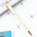 Retractable ballpoint pen featuring a yellow daisy pattern and glitter finish - Daisy Candy Yellow (New) / 1.0mm Bullet Tip