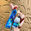 Cute Pochacco cartoon keychain featuring a blue strap and small alien pendant - Pacha Dog Strawberry Hat - Hugging Three-eyed Boy