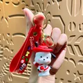 Red cartoon dog character keychain with silicone strap and 3D figure pendant - Pacha Dog Strawberry Hat - Red Cowboy Hat