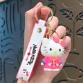 Adorable Hello Kitty keychain charm wearing pink Chinese outfit with branded wrist strap - Hello Kitty-Tang Suit
